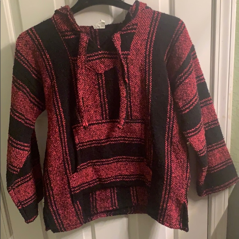 Woman’s sweater.